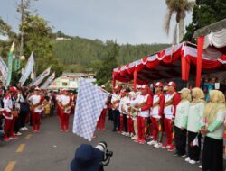 Kirab Api PON XXI Aceh-Sumut Tiba Di Aceh Tengah Ribuan Warga Padati Kota Takengon
