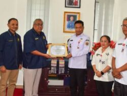 Bupati Humbahas Terima Penghargaan dari KPPN Balige