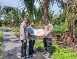 Cegah Karhutla, Polsek Kuala Kampar Turun Langsung Sosialisasi ke Warga