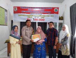 Polsek Bunut Kawal Pembagian BLT Juni 2025 di Desa Lubuk Terap, 32 Warga Kurang Mampu Terima Bantuan