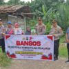 Peringati HUT Bhayangkara, Polisi Bantu Warga Kurang Mampu di Kuala Kampar
