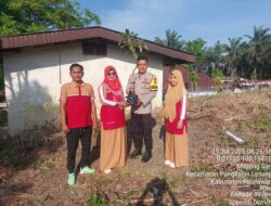 Sinergi Polri dan Sekolah Dukung Penghijauan, Polsek Pangkalan Lesung Tanam Pohon di SDN 007