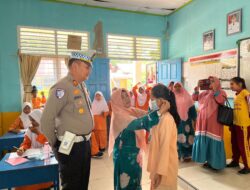 Dukung Penghijauan, Polsek Pangkalan Kuras Tanam Pohon di SDN 017 Sorek Satu