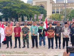 Wakapolres Lhokseumawe Hadiri Launching Pembagian Bendera Merah Putih, Kobarkan Semangat Nasionalisme dan Nilai Kebangsaan.