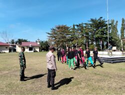 Bhabinkamtibmas Polsek Bunut Latih Paskibra di Bandar Petalangan