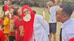 Aksi Kocak Kades Tanjung Beringin dan Istri di Lomba Makan Kerupuk HUT RI ke-80