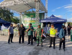 Bhabinkamtibmas Kampung Kusamba Amankan Jalan Sehat Peringatan Isra Mi’raj
