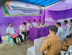 Sinergi Polisi dan Pemerintah, Polsek Kerumutan Amankan Rapat Penguatan Data Kependudukan