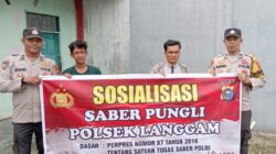 Polisi Sosialisasi Saber Pungli di Segati Pelalawan, Warga Diimbau Tolak Calo