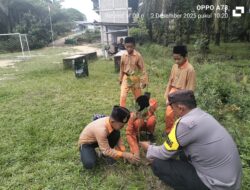 Siswa dan Polisi Bersinergi Tanam Pohon di Kecamatan Kerumutan