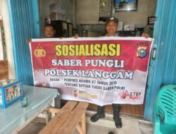 Polsek Langgam Sosialisasikan Saber Pungli di Desa Segati