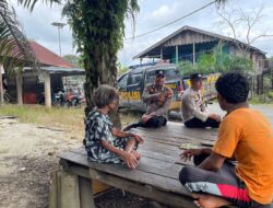 Polsek Pangkalan Kuras Sosialisasikan Antisipasi Banjir ke Warga Bantaran Sungai Kampar