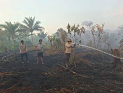 Sepuluh Titik Panas Terpantau, Polsek Kuala Kampar Lakukan Pendinginan