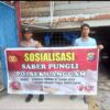 Polsek Langgam Sosialisasikan Saber Pungli di Pasar Desa Segati