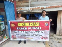 Polsek Langgam Sosialisasikan Saber Pungli di Pasar Desa Segati