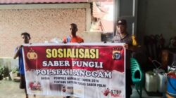 Polisi Gencarkan Sosialisasi Saber Pungli di Pasar Desa Segati Pelalawan