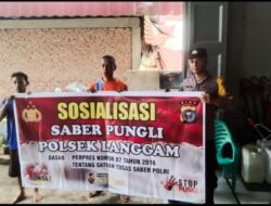 Polisi Gencarkan Sosialisasi Saber Pungli di Pasar Desa Segati Pelalawan