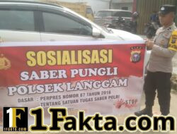 Polsek Langgam Sosialisasikan Saber Pungli di Pasar Desa Segati