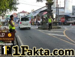 Personel Polsek Rendang Polres Karangasem Lakukan Pos Strong Point, Atur Arus Lalu Lintas di Simpang 4 Pasar Menanga saat Kegiatan Karya IBTK Pura Besakih