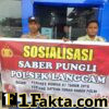 Polisi Gelar Sosialisasi Saber Pungli di Pasar Desa Segati Pelalawan