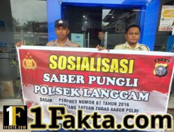 Polisi Gelar Sosialisasi Saber Pungli di Pasar Desa Segati Pelalawan