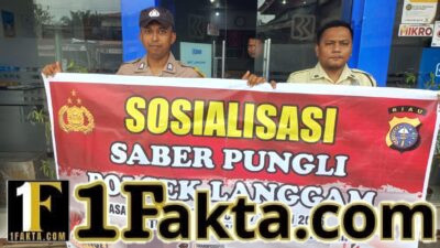 Polisi Gelar Sosialisasi Saber Pungli di Pasar Desa Segati Pelalawan