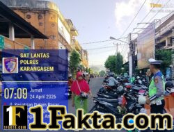 Anggota Kamsel Satuan Lalu Lintas Polres Karangasem Sosialisasikan Penerangan keliling di Pasar Timur Amlapura