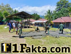 Hadapi Hujan, Satgas TMMD Ke-128 Tetap Semangat dengan Pembangunan Tenda Lapangan