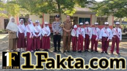Upacara di SD Pematang Tinggi, Polisi Ingatkan Siswa Jauhi Judi Online
