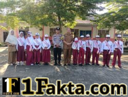 Upacara di SD Pematang Tinggi, Polisi Ingatkan Siswa Jauhi Judi Online