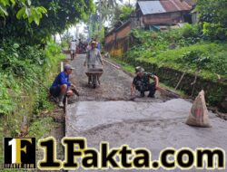Dari Tanah ke Beton, Babinsa Pesagi Bersama Warga Wujudkan Jalan Layak Antar Banjar