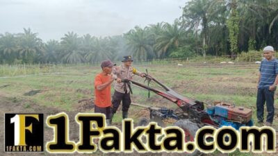 Dukung Ketahanan Pangan, Polsek Kerumutan Bantu Pembukaan Lahan Pertanian Warga