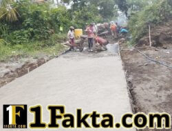 Jalan rabat beton yang dibangun Satgas TMMD ke- 128 Kodim 1623/Karangasem menghubungkan dua dusun