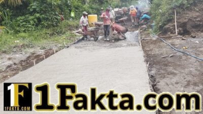 Jalan rabat beton yang dibangun Satgas TMMD ke- 128 Kodim 1623/Karangasem menghubungkan dua dusun