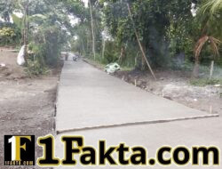 TNI lahir dari rakyat untuk rakyat kembali memberikan program TMMD ke 128 Kodim 1623/Karangasem Pembangunan rabat beton sepanjang 1.450 meter