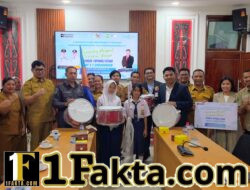 Dorong Prestasi dan Disiplin Siswa, Bupati Taput Serahkan Bantuan Marching Band dari PT Angkasa Pura Indonesia