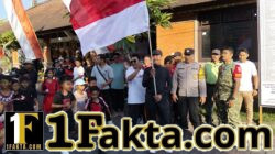 Jelang HUT RI ke-81, Babinsa Desa Penarukan Hadir Pastikan Jalan Sehat Berjalan Aman